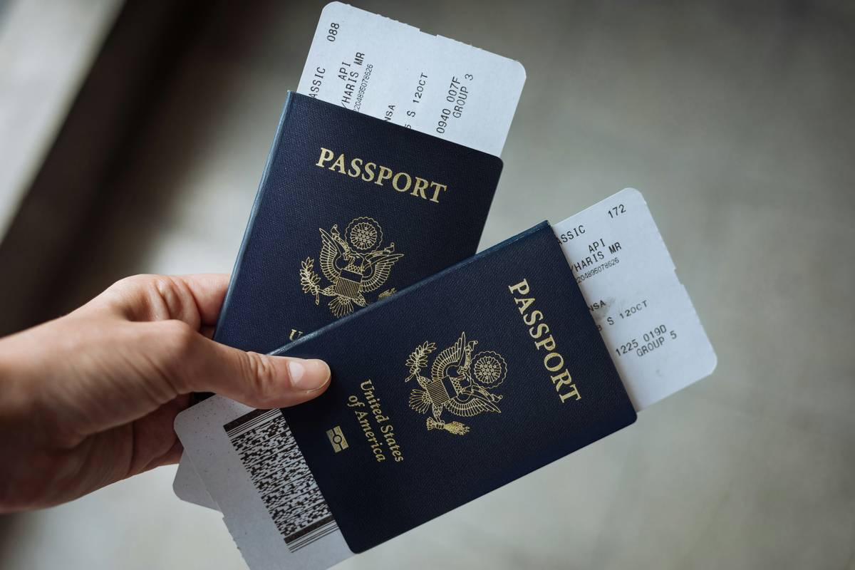 Luggage tags showing different airline logos with partner flights info